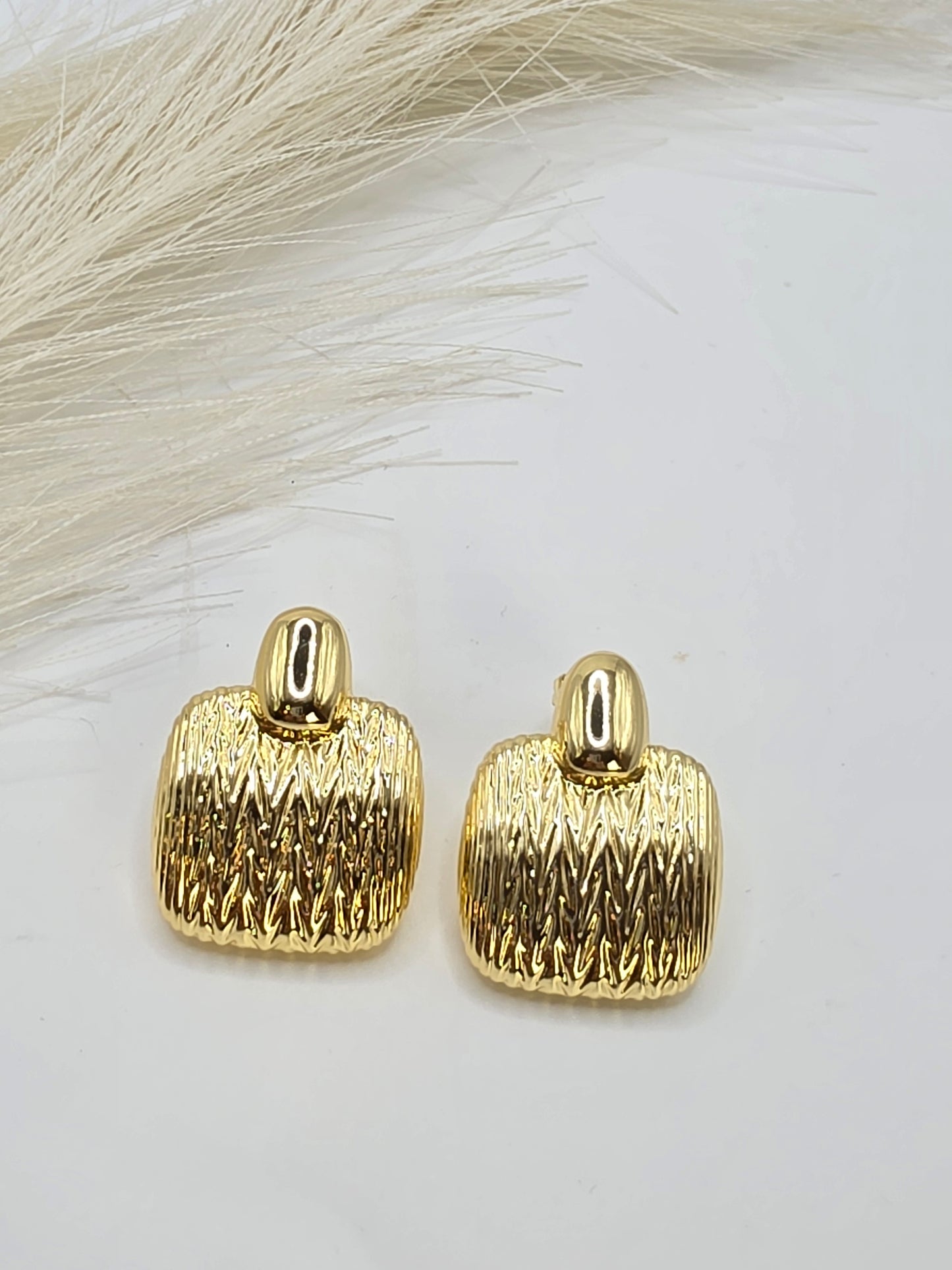 Aretes estilo coqueta