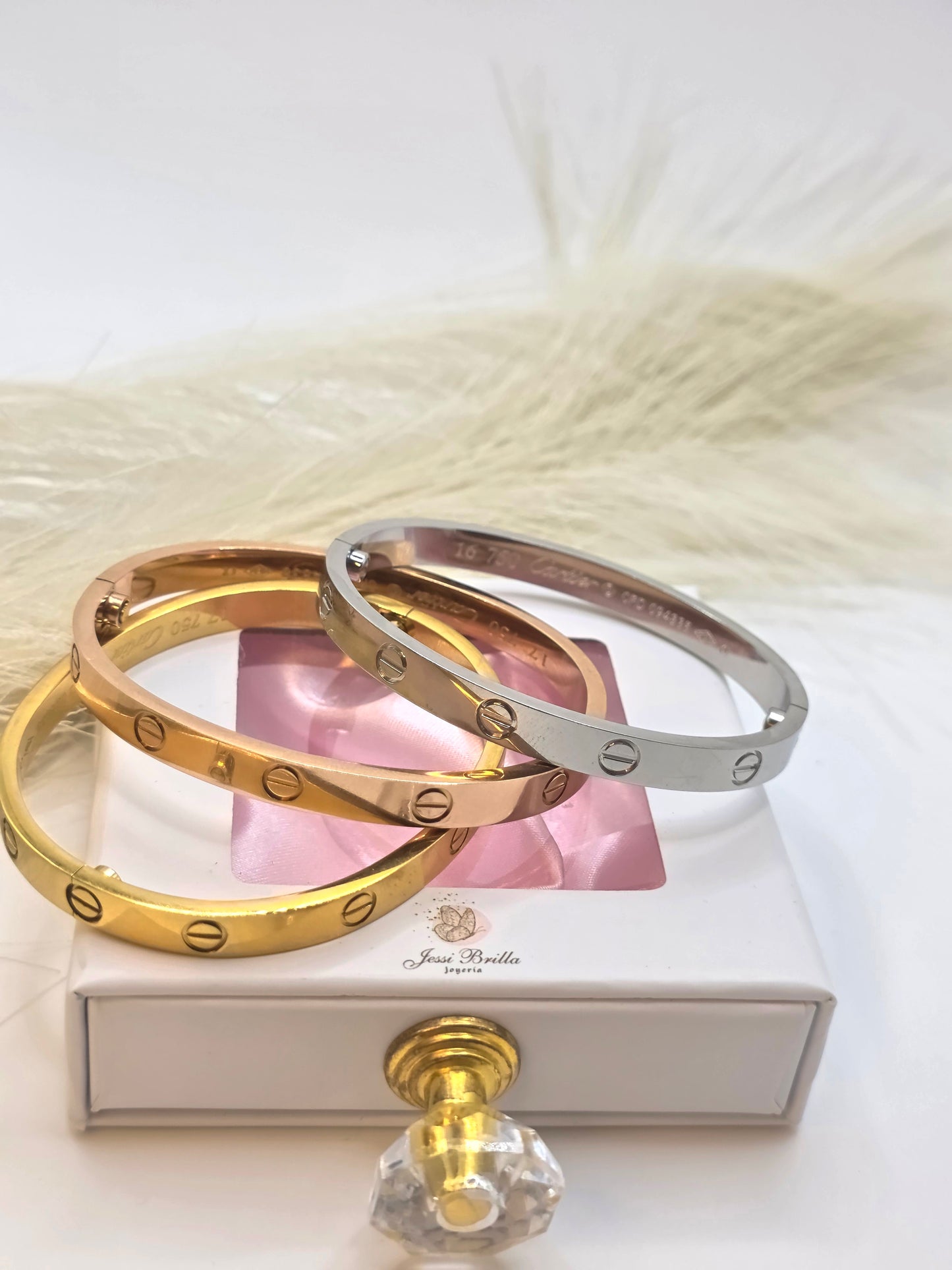 Gold-colored marked bracelet